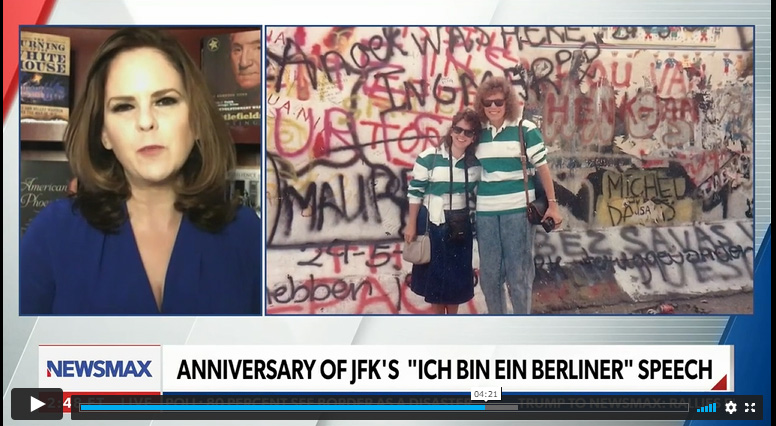 Jane, left, visited the Berlin Wall in 1989 a few months before it fell.